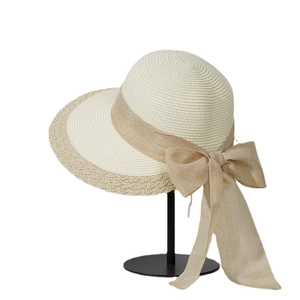 Elegant wide brim straw sun hat with ribbon bow for women's summer beach sun protection