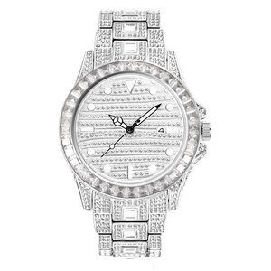 Detailed macro view of silver luxury watch with full crystal pavé and date display feature