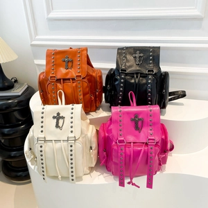 Gothic style rivet backpack with cross decor in orange black and cream colors
