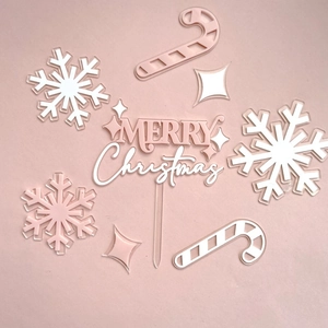 Acrylic Christmas cake topper set featuring snowflakes, candy canes, and MERRY Christmas letters.