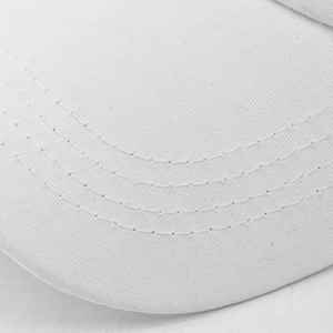 Macro view of white cotton twill baseball cap brim with four rows of parallel stitching