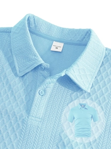 Detailed macro view of light blue waffle jacquard fabric texture on men's polo shirt