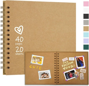 Detail of spiral bound kraft photo album showing internal pages with photos and stickers