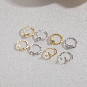 Set of 8 adjustable snake and fish tail rings with zircon in gold and silver plating