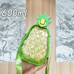 Detail showing the adjustable shoulder strap and 600ml capacity of pineapple water bottle