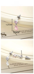 Macro shot of colorful heart drop earrings with dimensions of 1.27cm length and 0.39cm width