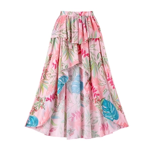 Front view of floral ruffled high-low hem skirt with tropical palm leaf prints