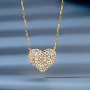 Sparkling 925 sterling silver heart pendant necklace with gold plating and paved crystals
