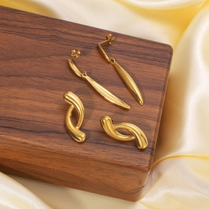 Unique 18K gold-plated stainless steel snake geometric drop earrings on brown wood box