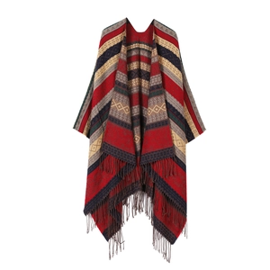 Bohemian knit poncho with red and navy geometric stripes and fringe trim detail