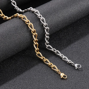 Macro shot of 7mm snake link necklaces in gold and silver finishes with lobster clasp