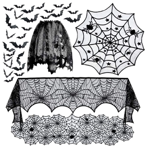 Detail of black lace Halloween decor set with spider web table runner and bat decals