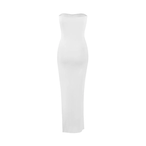 Detail of a white strapless bodycon maxi dress with a slim fit and side slit design