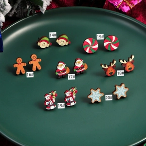 Set of 7 festive Christmas wooden stud earrings featuring Santa, reindeer and snowflakes