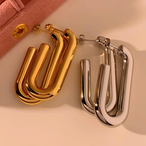 Minimalist U-shaped hollow stainless steel hoop earrings in gold and silver finish