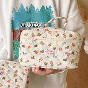 Quilted floral bear makeup bag in off-white with large capacity and portable handle