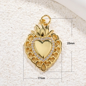 Detailed view of a gold-plated heart pendant with zircons and 25mm by 17mm dimensions
