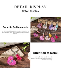 Detail showing smooth acrylic edges and colorful tassels on heart-shaped keychains