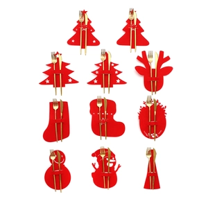 Christmas felt cutlery holders set featuring reindeer and snowman shapes for table decor