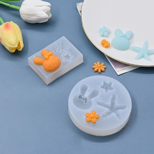 DIY silicone mold set featuring starfish flower and rabbit shapes for fondant or clay
