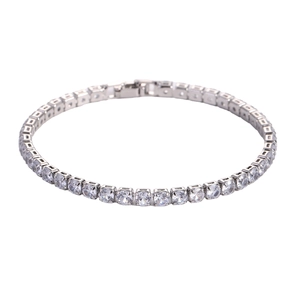Silver tennis bracelet with round-cut cubic zirconia in a classic claw setting on white backdrop