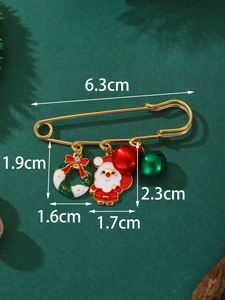 Detailed view of Christmas brooch dimensions showing Santa and wreath charms on a pin