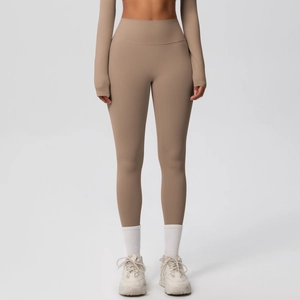 Detail of high-waisted moisture-wicking yoga leggings in mocha with brushed texture