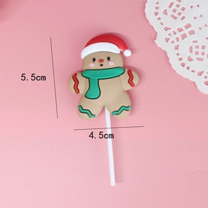 Detail of soft gingerbread man cake topper with dimensions 5.5cm height and 4.5cm width