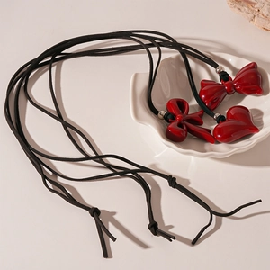 Vintage red resin bow and heart pendant necklace with black velvet cord for women