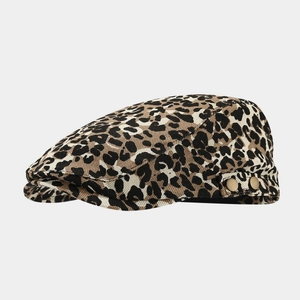 Detail of vintage leopard print beret featuring dual side metal buttons on canvas