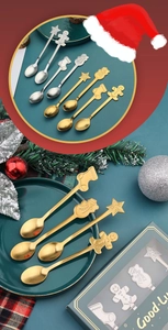 Detail view of 8-piece festive Christmas stainless steel spoons with themed pendants