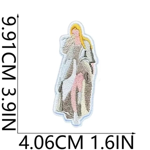 Size detail of Taylor embroidery patch showing height 9.91cm and width 4.06cm measurements