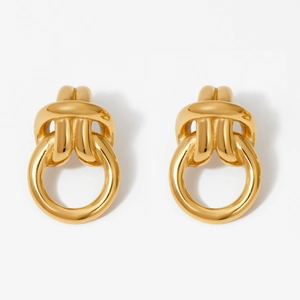 Classic gold twisted knot hoop earrings with polished finish on a white background