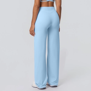 Detail of high waisted flare yoga pants with V-shaped back seam for butt lifting effect