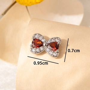 Elegant bow-shaped titanium steel studs with red pear stones and silver pavé crystals