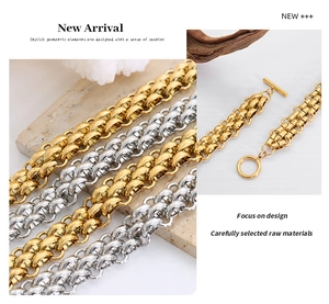 Detail of chunky chain bracelet in gold and silver finish with OT toggle clasp design