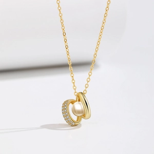 Elegant 925 silver necklace with interlocking gold rings, cubic zirconia and freshwater pearl