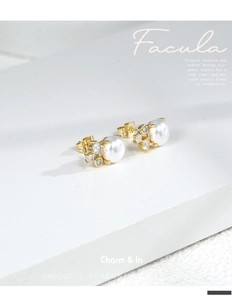 Detailed view of elegant white pearl stud earrings with sparkling cubic zirconia on gold base