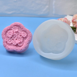 Translucent silicone flower mold and pink daisy floral embossed soap crafting result