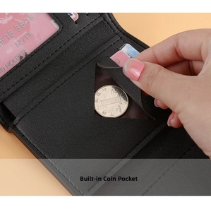 Detail view of the black wallet interior featuring card slots and a built-in coin pocket