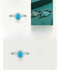 Detailed view of S925 silver ring featuring oval turquoise and cubic zirconia cluster