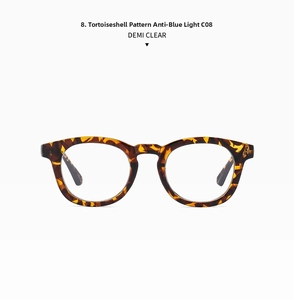 Close-up of tortoise shell oval glasses frame with clear blue light blocking lenses C08