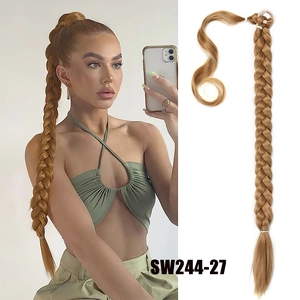 Detailed view of long braided ponytail extension in golden brown with model display