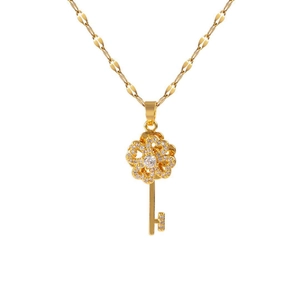 Rotating flower key pendant necklace in gold with zircon stones on a link chain