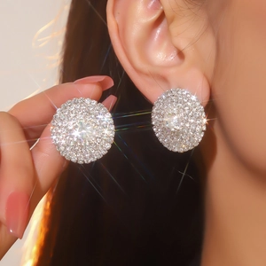 Luxurious round sparkling rhinestone stud earrings for women with brilliant diamond-like stones