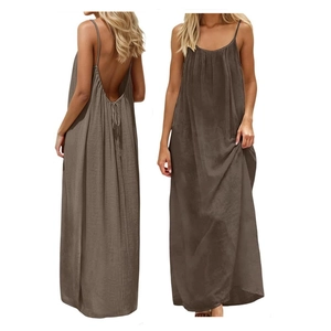 Detail of dark brown backless maxi dress showing the pleated texture and open back design
