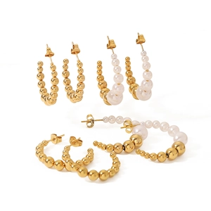 Classic stainless steel C-shaped earrings with gold beads and pearls on white background