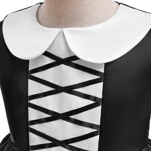 Detail of girls' Halloween dress featuring a white Peter Pan collar and black lace-up corset