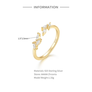 Macro detail of gold S925 sterling silver leaf ring showing size and zirconia setting