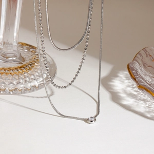 Three-layer silver stainless steel necklace with bead chain and round crystal pendant